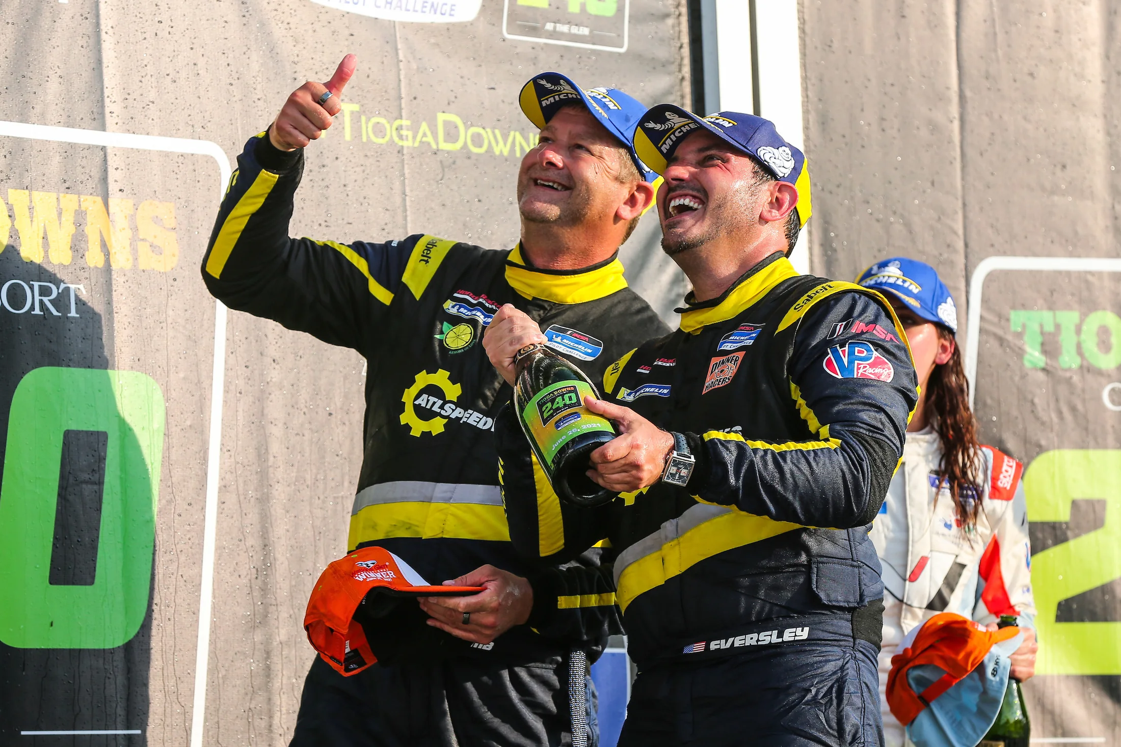 Todd Lamb and Ryan Eversley celebrate an IMSA victory at Watkins Glen